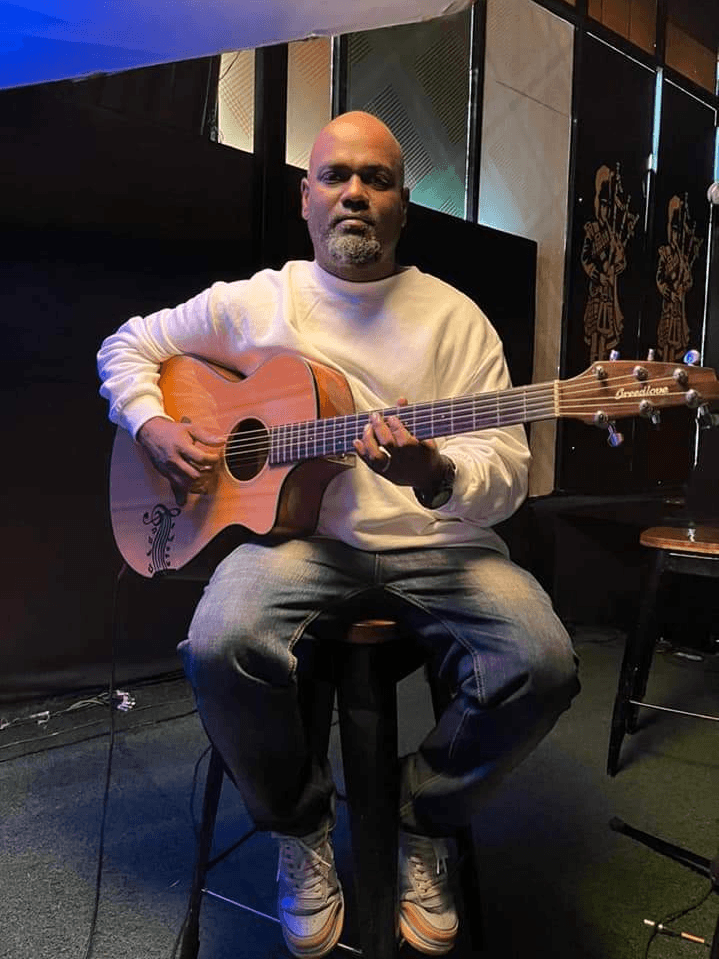 Joel Sastry - Shoot with acoustic guitar